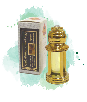 Parfum concentré Musc d'Or 'Rouh Al Musc' en bouteille dorée